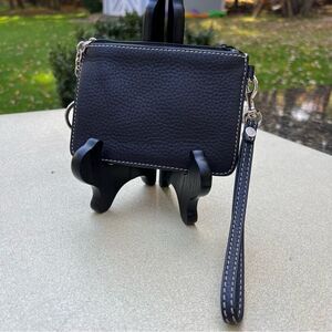 Dooney & Bourke black coin purse/wristlet with silver tone hardware